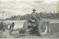1945-George-Crosby-on-Tractor-at-Ranch-in-Greer